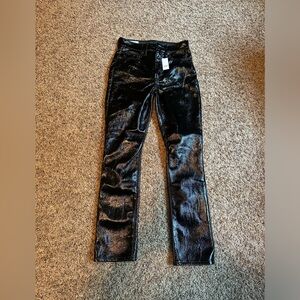 Woman’s faux leather pants. (See inside tag)